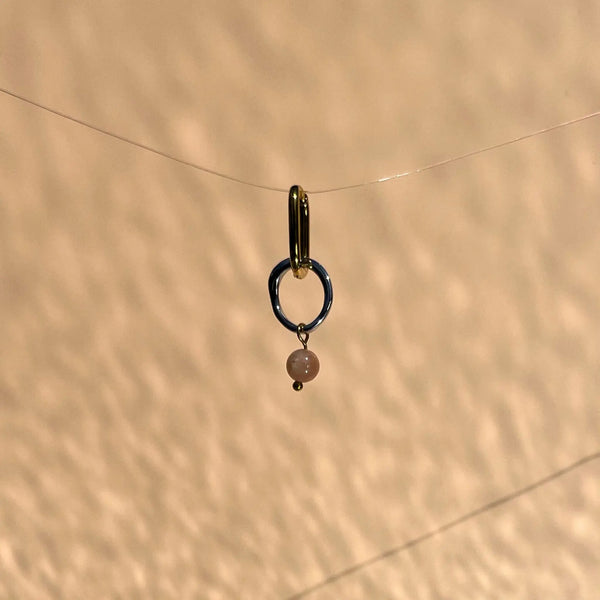 boucle d'oreille en acier inoxydable et pierre de soleil