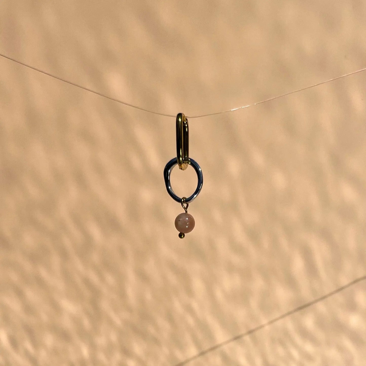 boucle d'oreille en acier inoxydable et pierre de soleil
