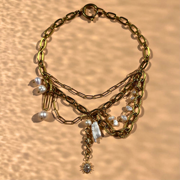 collier ras de cou multichaines avec perles de culture et charm soleil